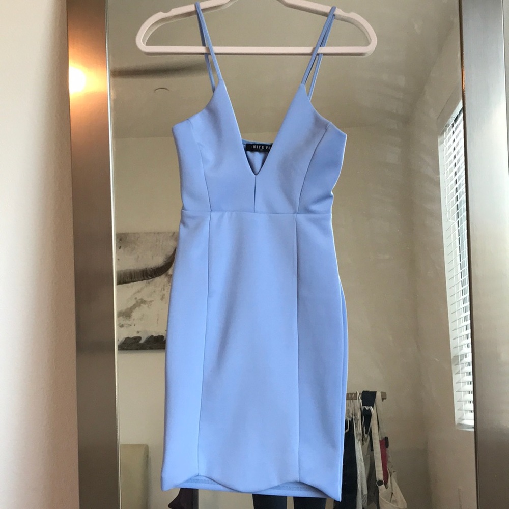 Never been worn white fox light blue dress .
